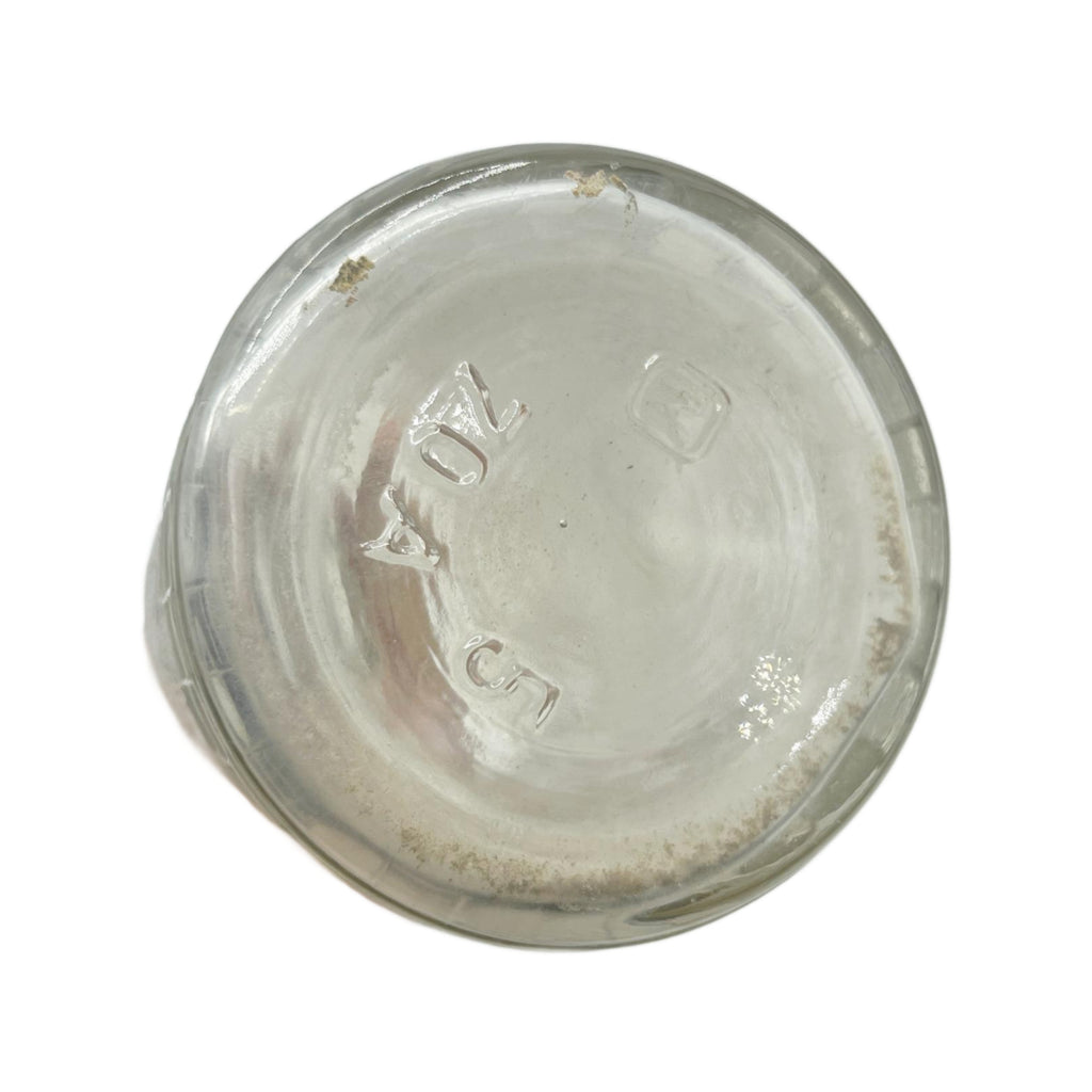 Antique Clear Glass Embossed Barbers Bottle