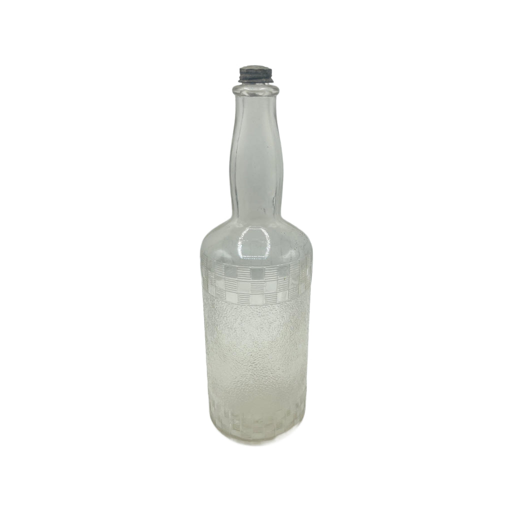 Antique Clear Glass Embossed Barbers Bottle