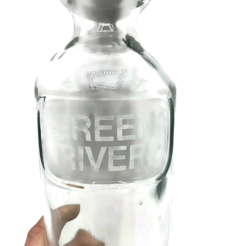 Available is a vintage Green River Soda Fountain Syrup Bottle.