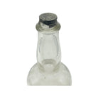 Antique Clear Glass Embossed Barbers Bottle 